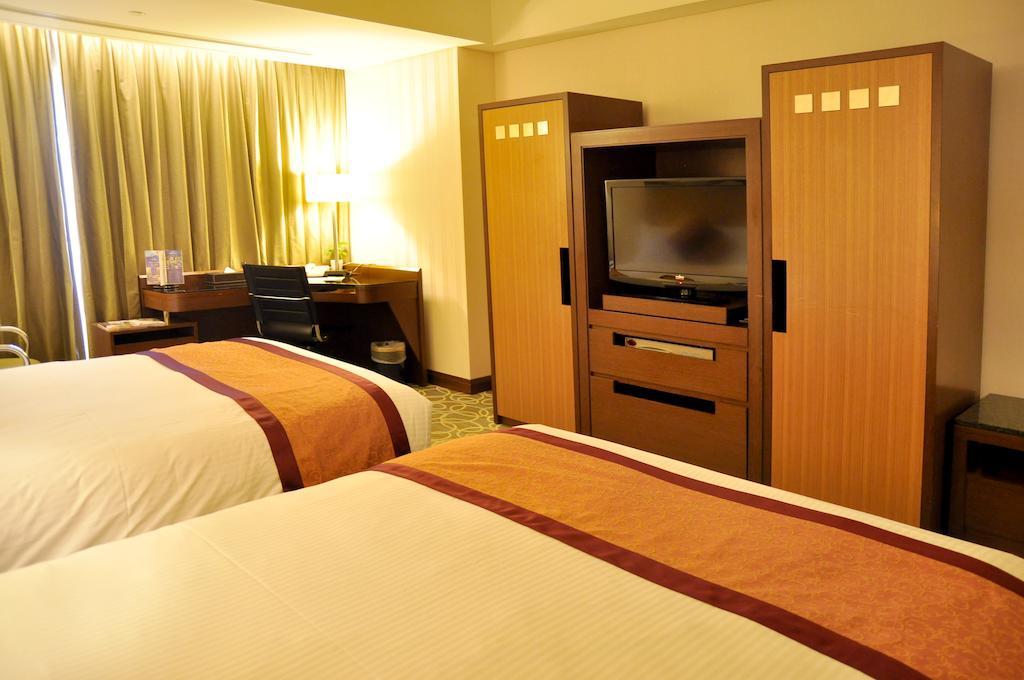 Evergreen Plaza Hotel - Tchaj-nan Pokoj fotografie Deluxe room